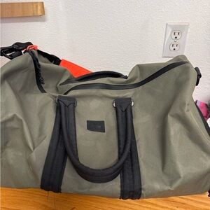 Herschel Green Duffel Bag with Black Accents